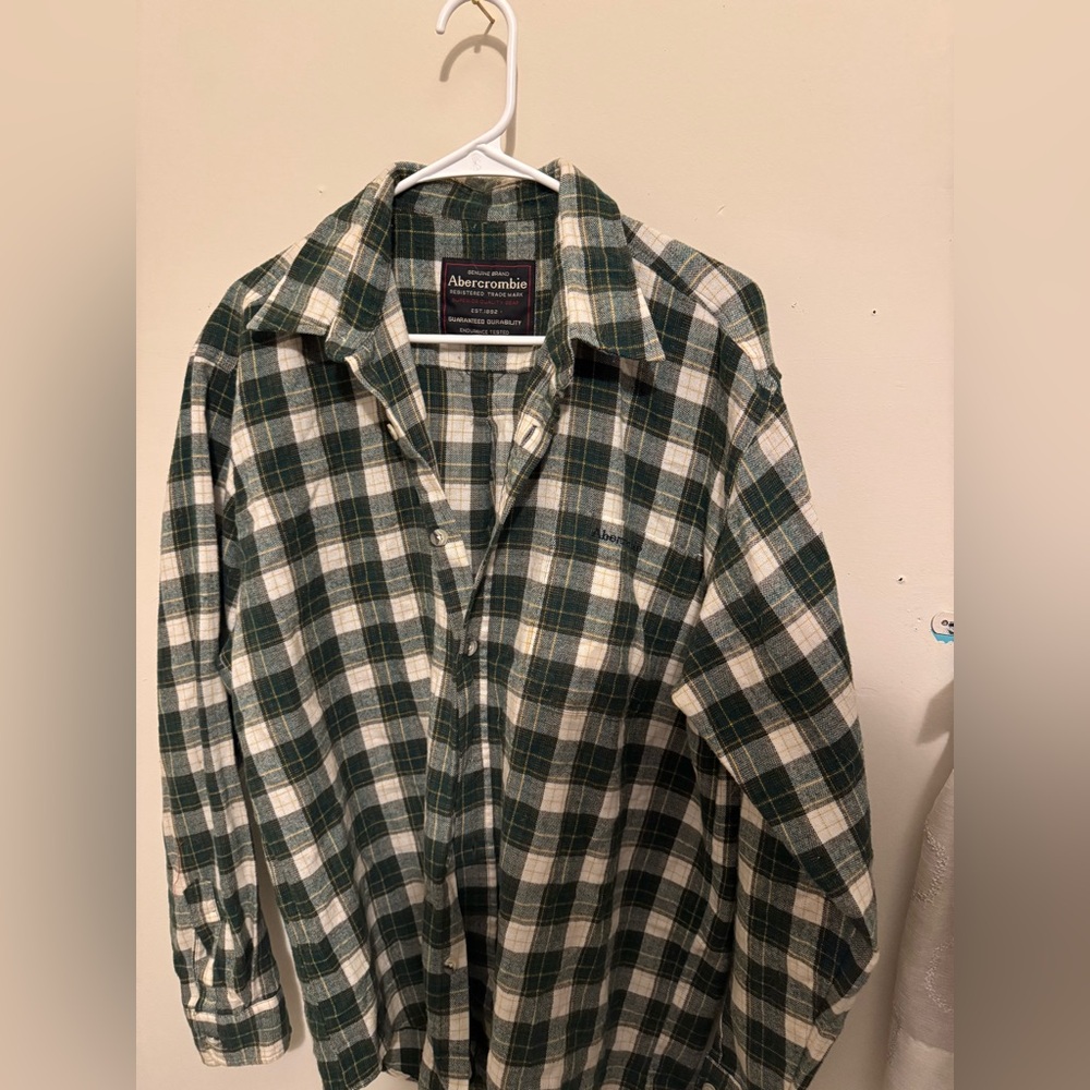 A Green and white printed men’s flannel.